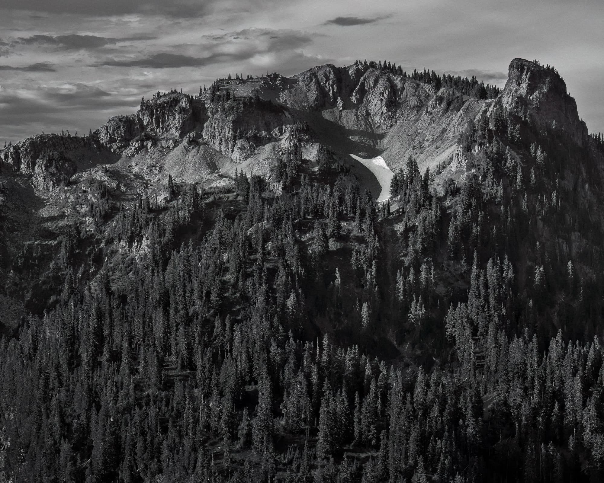 A black and white landscape photograph of 6,337 foot Seymour Peak as viewed along the Naches Peak Loop trail near Chinook Pass, Washington.